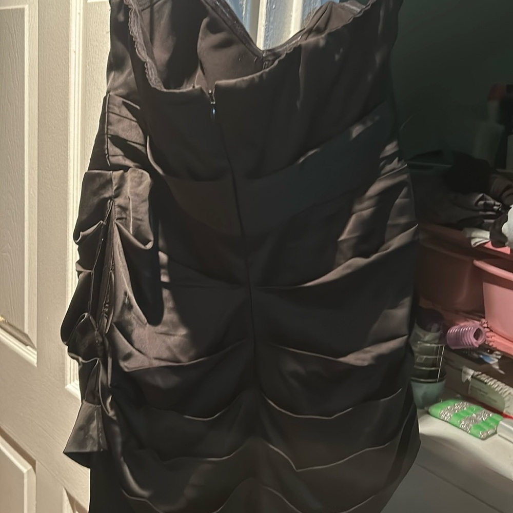 Brand X NBD.  Corset until waist.  Color shiny black.  Fits size 8-10.